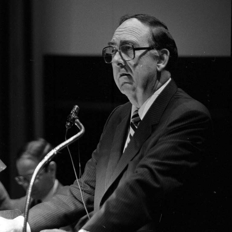 Former Chancellor Glenn Irwin delivers the State of the Campus address in 1982.