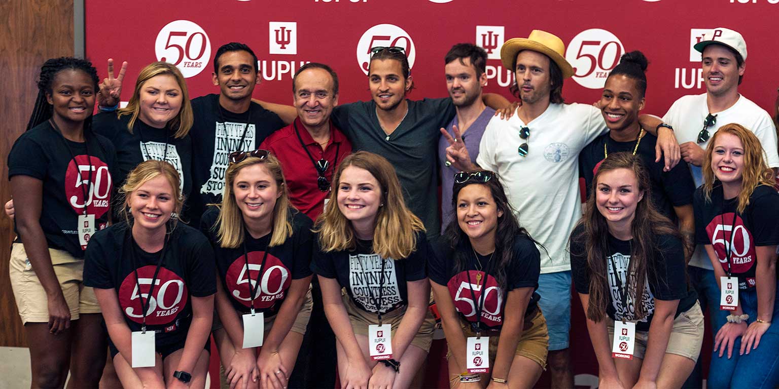 Students and IUPUI Chancellor Paydar meet with WOW Concert headliner Atlas Genius.
