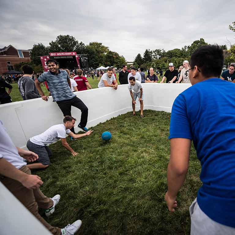 Students play gaga ball in between concert acts.
