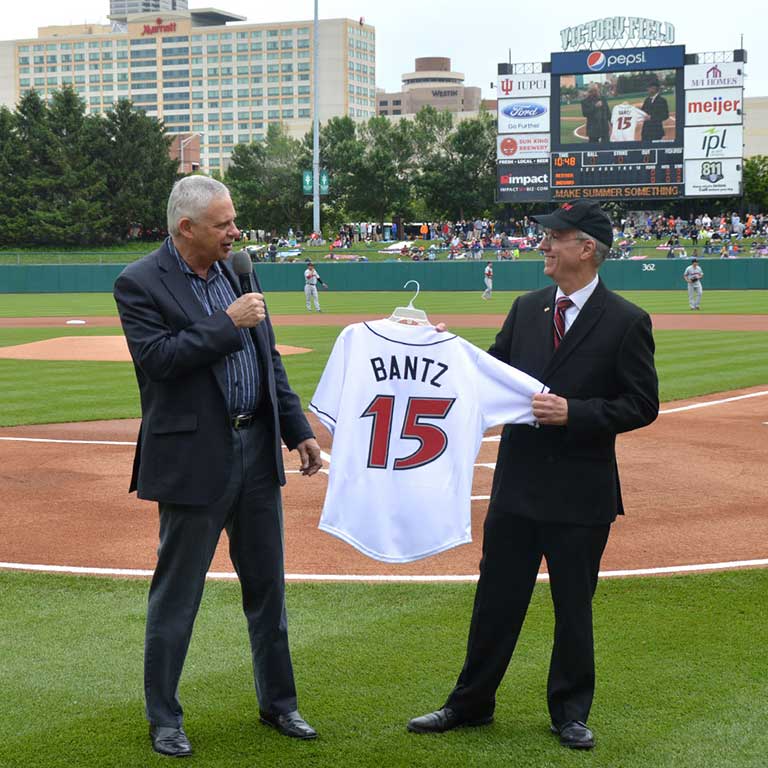 Former Chancellor Charles Bantz receives an honorary Indianapolis Indians baseball jersey in honor of his retirement.