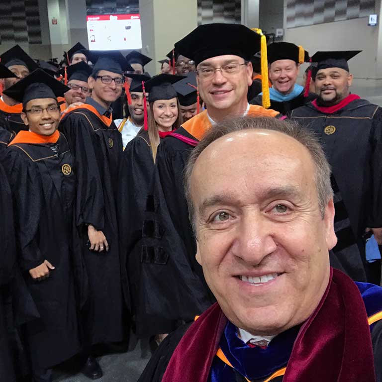 Chancellor Nasser Paydar takes a selfie with the School of Engineering graduating class of 2018.