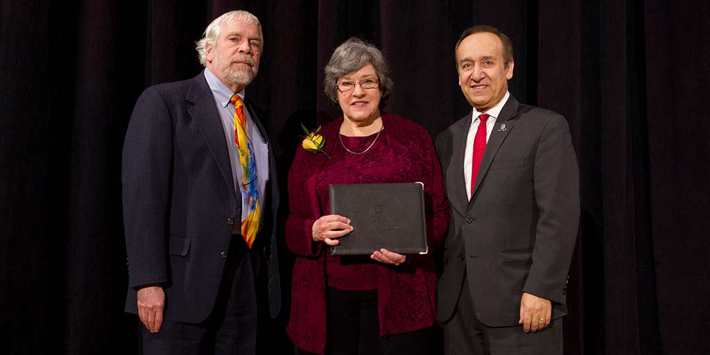 Former University Library Dean David Lewis, Claudia Dille, and IUPUI Chancellor Nasser H. Paydar at the 2018 Spirit of Philanthropy luncheon
