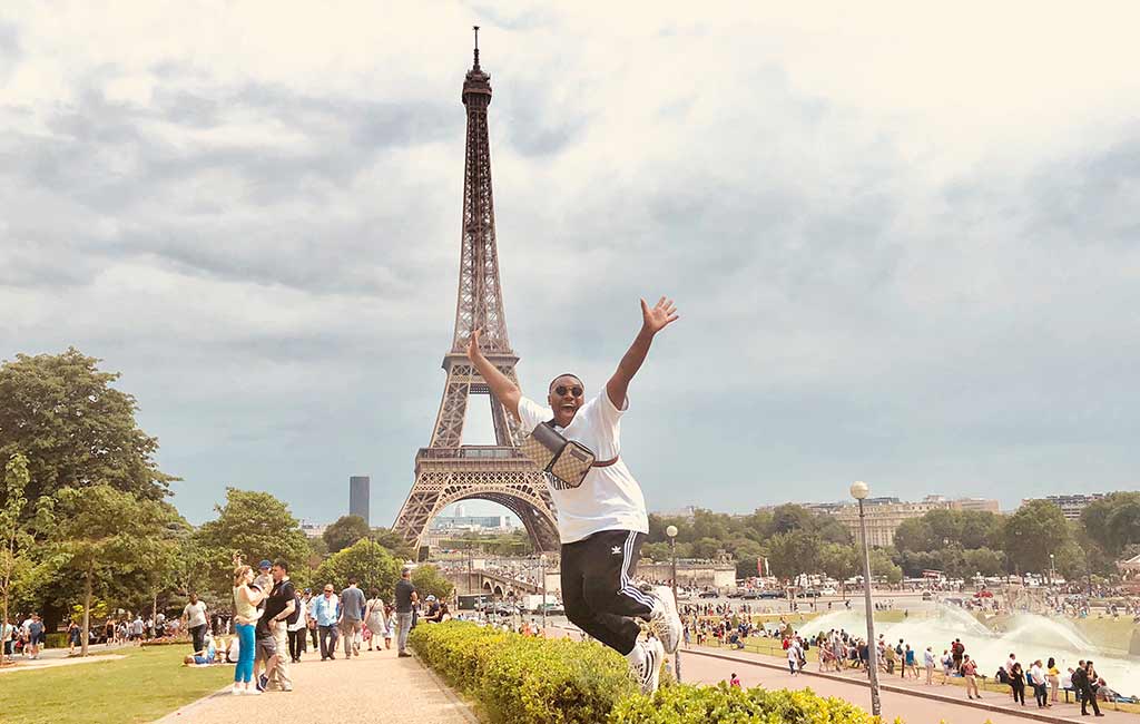 Tyler Williams leaps in front of the Eiffel Tower in Paris